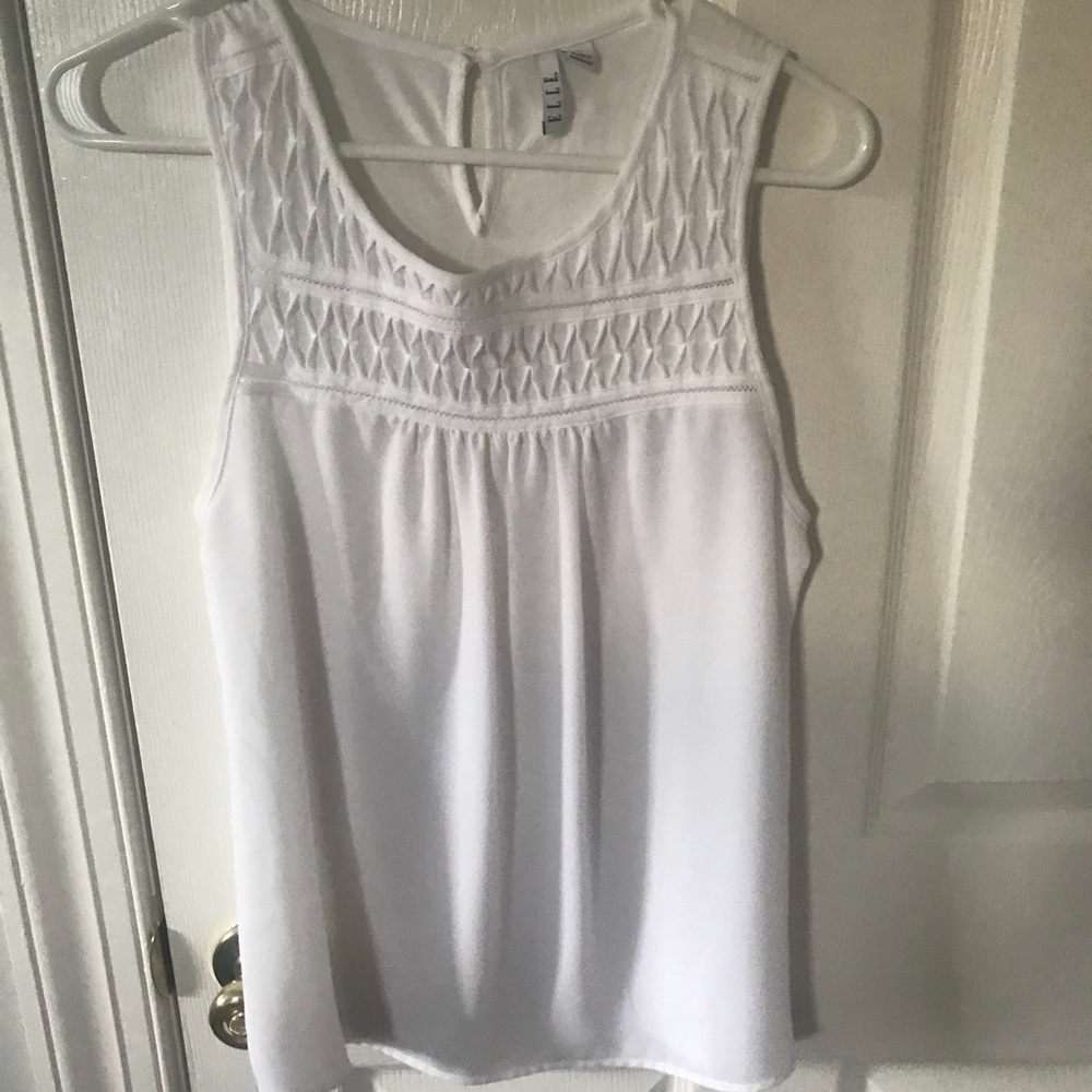 White sleeveless blouse